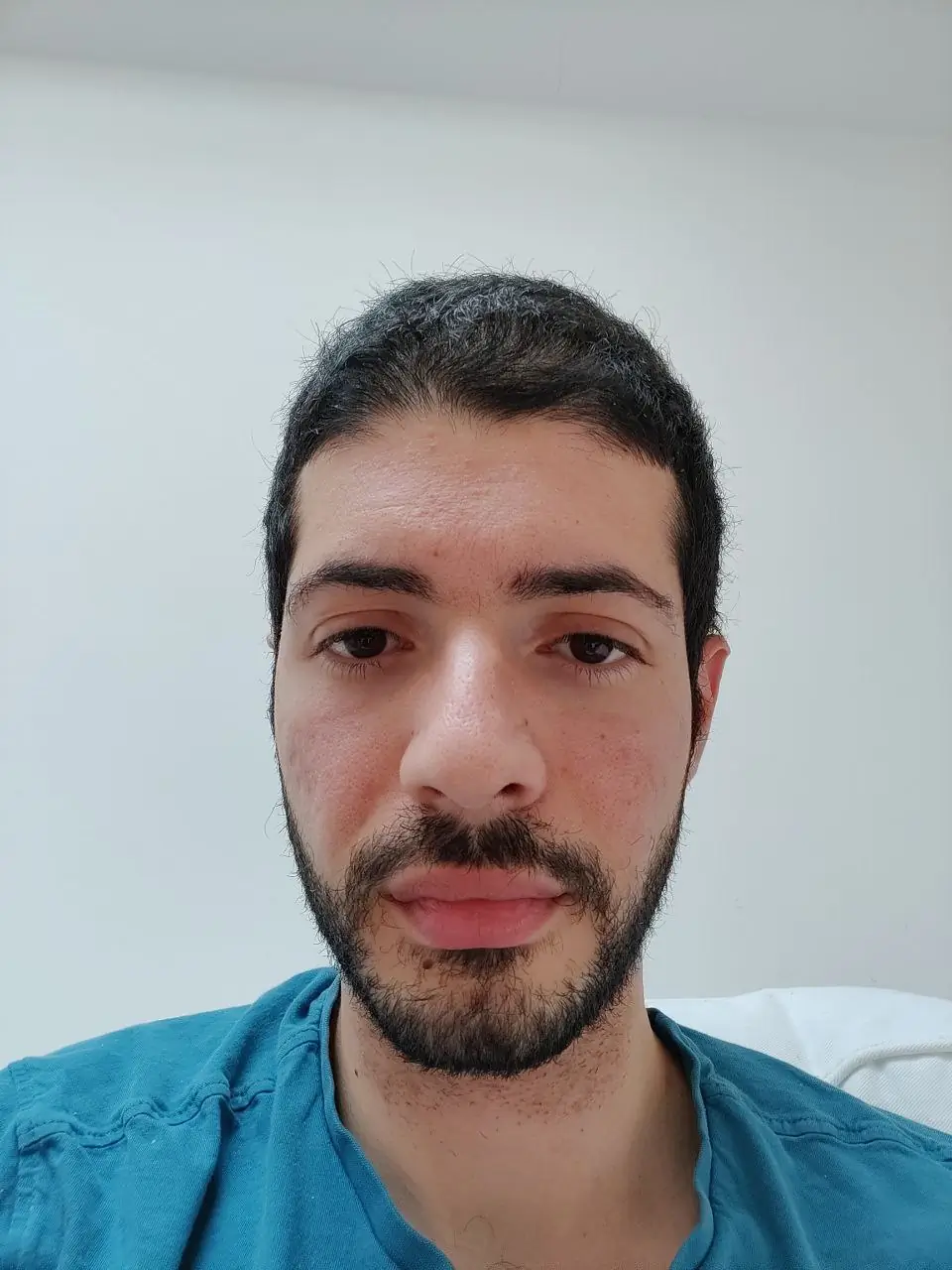 Selfie upload example for an AI clone, indoor lighting